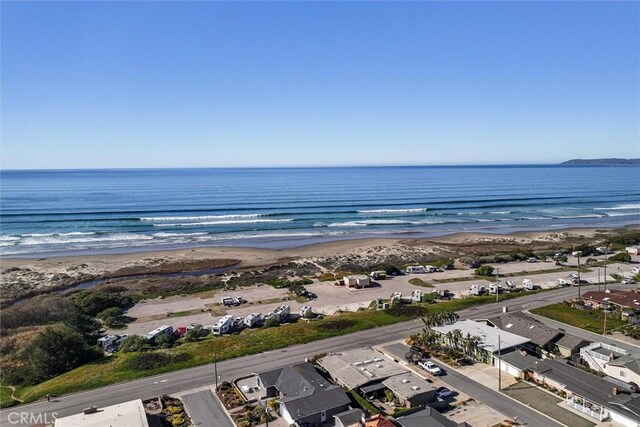 aerial view with a view of the beach and a water view