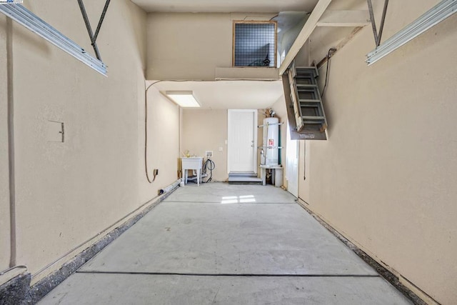 interior space with secured water heater and a patio