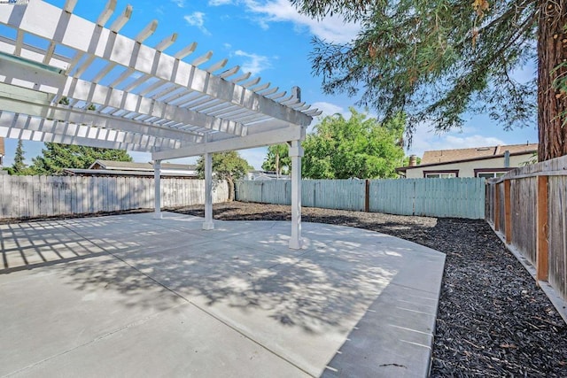 view of patio featuring a pergola