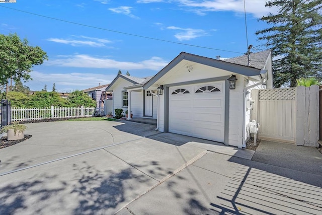 ranch-style home featuring a garage