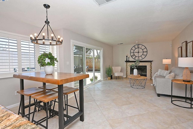 dining area with a notable chandelier