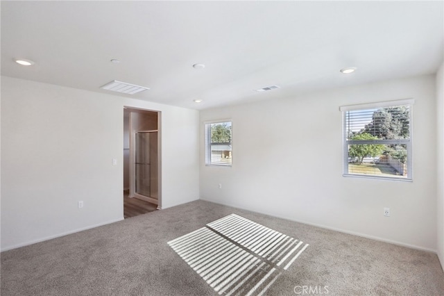 unfurnished bedroom with carpet