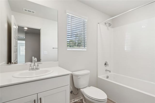 full bathroom with vanity, toilet, and shower / bath combination