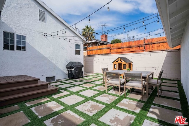 view of patio / terrace with a grill