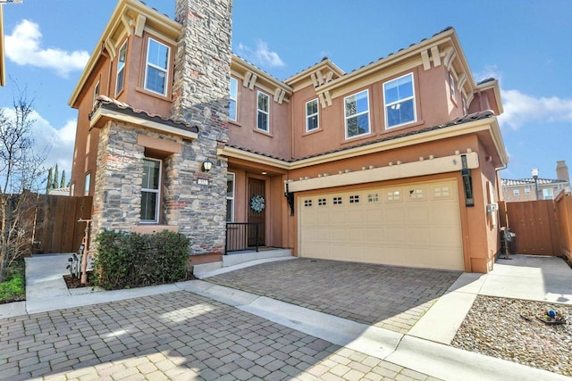 view of front of home with a garage