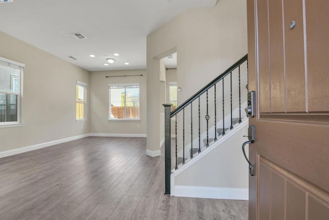 entryway with light hardwood / wood-style floors