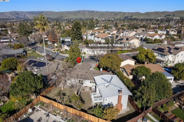 drone / aerial view featuring a mountain view