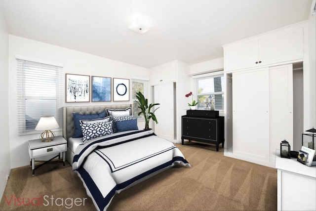 bedroom featuring light carpet