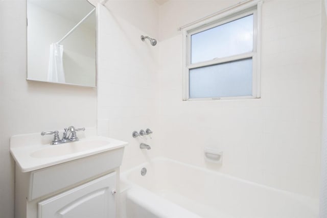 bathroom featuring shower / bath combination with curtain and vanity