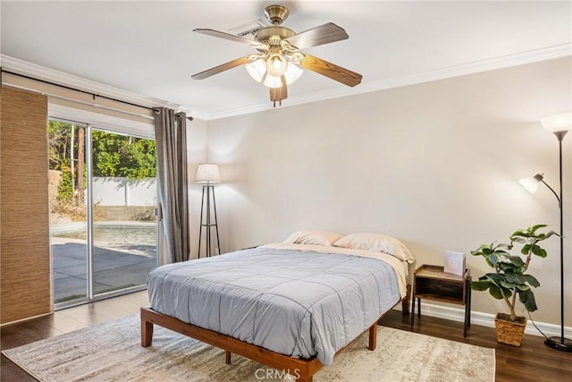 bedroom featuring dark hardwood / wood-style flooring, crown molding, access to outside, and ceiling fan