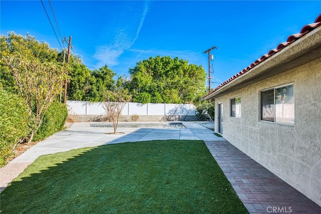 view of yard with a patio area