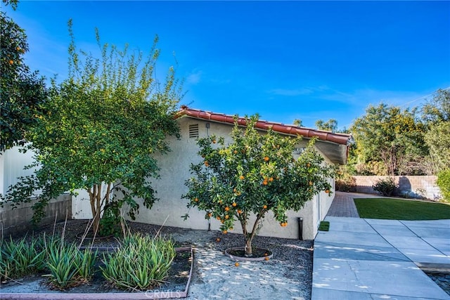 view of front of home with a patio area