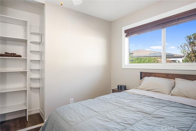 bedroom featuring hardwood / wood-style flooring