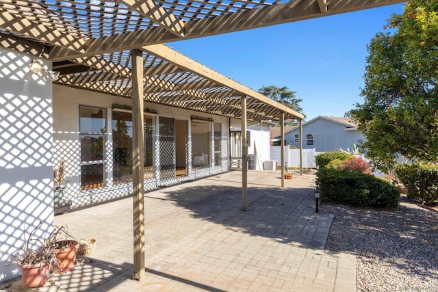 view of patio featuring a pergola