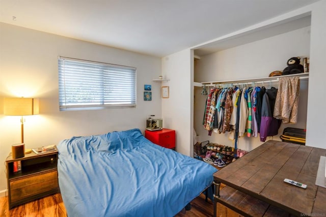 bedroom featuring hardwood / wood-style floors