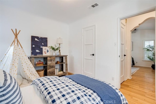 bedroom featuring hardwood / wood-style flooring