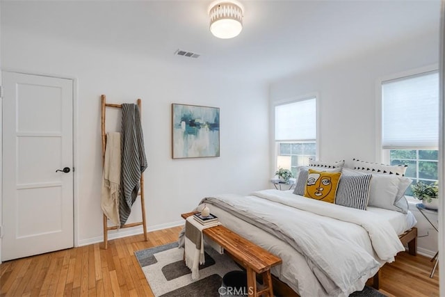 bedroom featuring light wood-type flooring