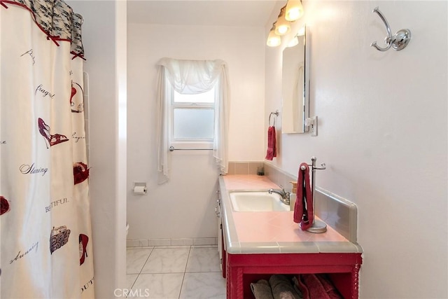 bathroom with tile patterned floors, vanity, toilet, and a shower with shower curtain