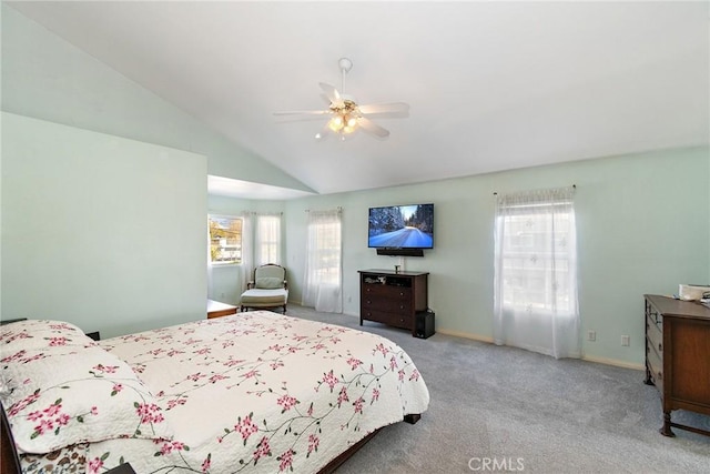 carpeted bedroom with lofted ceiling and ceiling fan