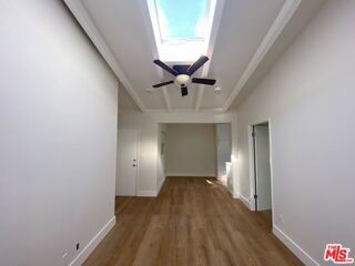 hall featuring hardwood / wood-style floors