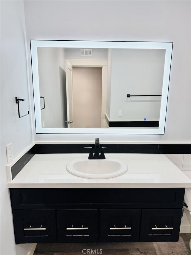 bathroom featuring vanity