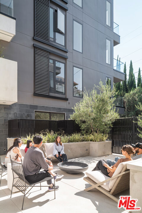 exterior space with a fire pit