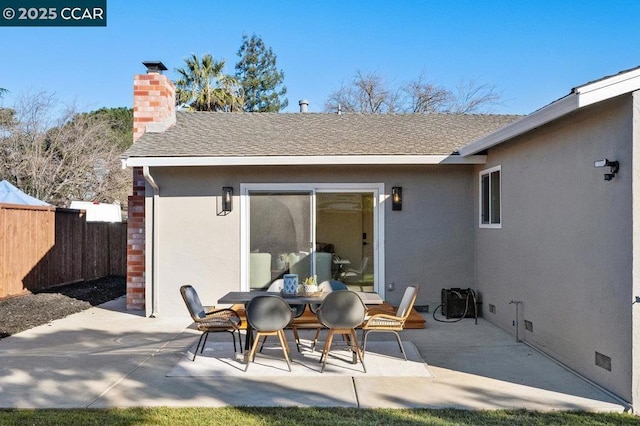 rear view of house featuring a patio