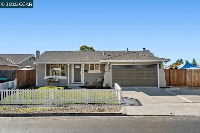 ranch-style home with a garage and a front lawn