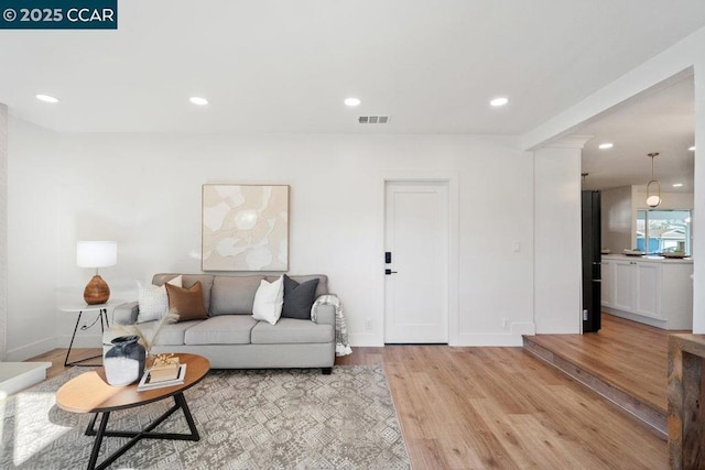 living room featuring light hardwood / wood-style floors