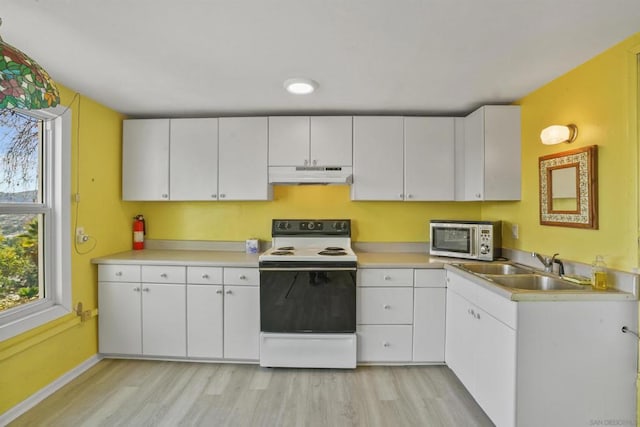 kitchen with white cabinetry, sink, electric range, and light wood-type flooring