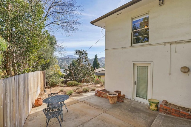 view of patio with a mountain view