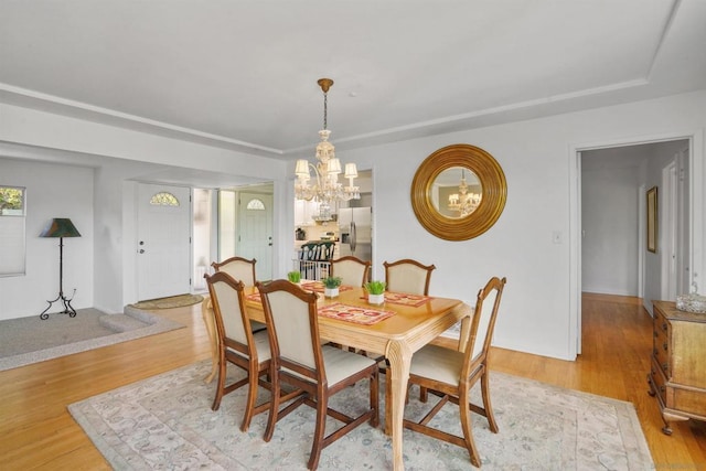 dining room featuring light hardwood / wood-style flooring