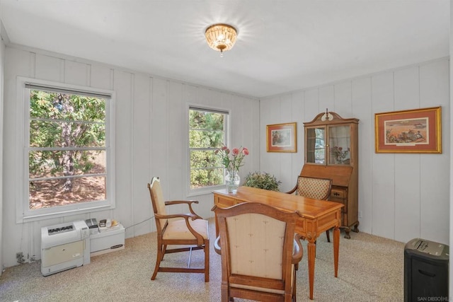 dining room with light carpet