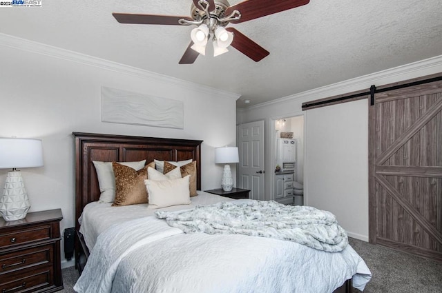 bedroom featuring carpet floors, ornamental molding, ceiling fan, a barn door, and a textured ceiling