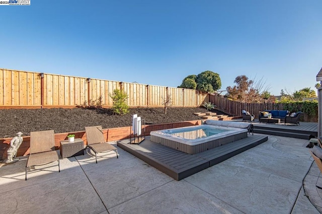 view of patio / terrace with an outdoor hangout area and a deck