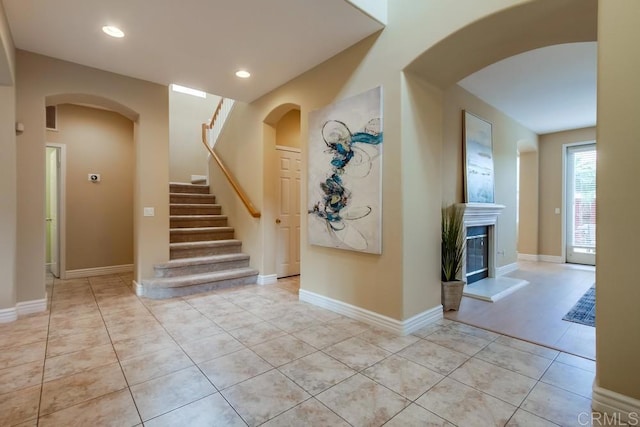 interior space with light tile patterned floors