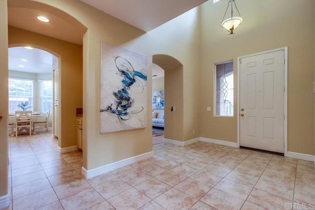 entryway with light tile patterned floors