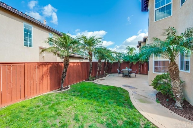 view of yard with a patio area