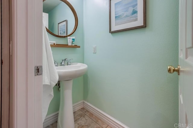 bathroom featuring tile patterned floors and sink