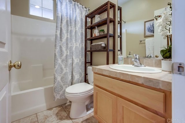 full bathroom featuring vanity, toilet, tile patterned flooring, and shower / bath combo with shower curtain