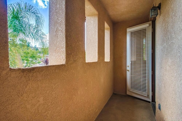 property entrance with a balcony