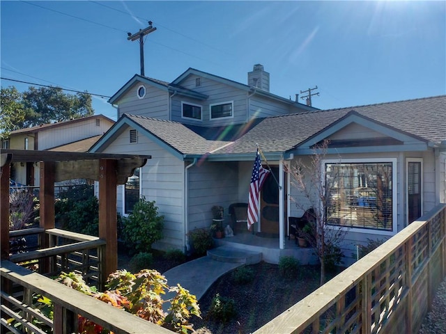 view of front of property featuring covered porch