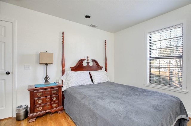 bedroom featuring light hardwood / wood-style floors