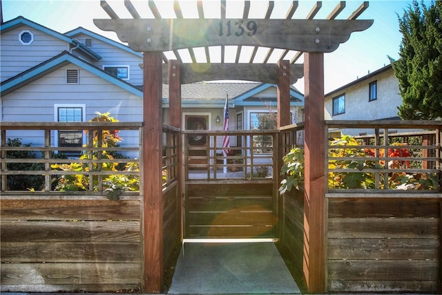 wooden deck with a pergola