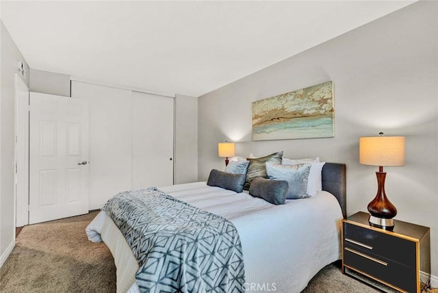 carpeted bedroom with a closet