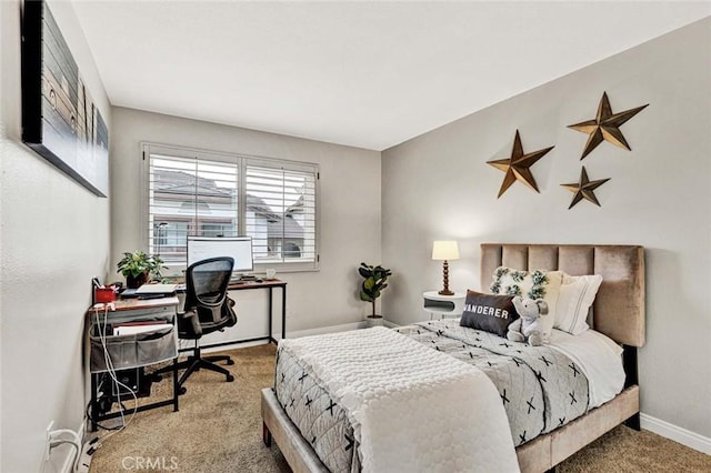 bedroom featuring light colored carpet