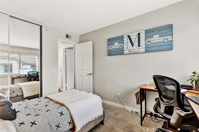 carpeted bedroom featuring a closet