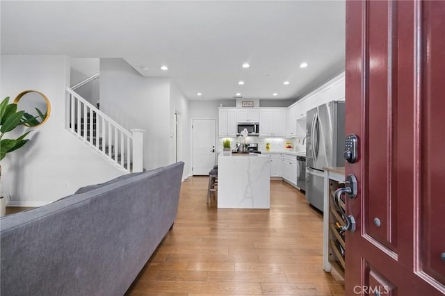 interior space with light hardwood / wood-style flooring