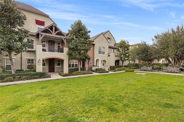 view of community with a lawn