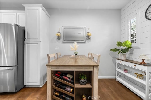 dining area with dark wood-type flooring